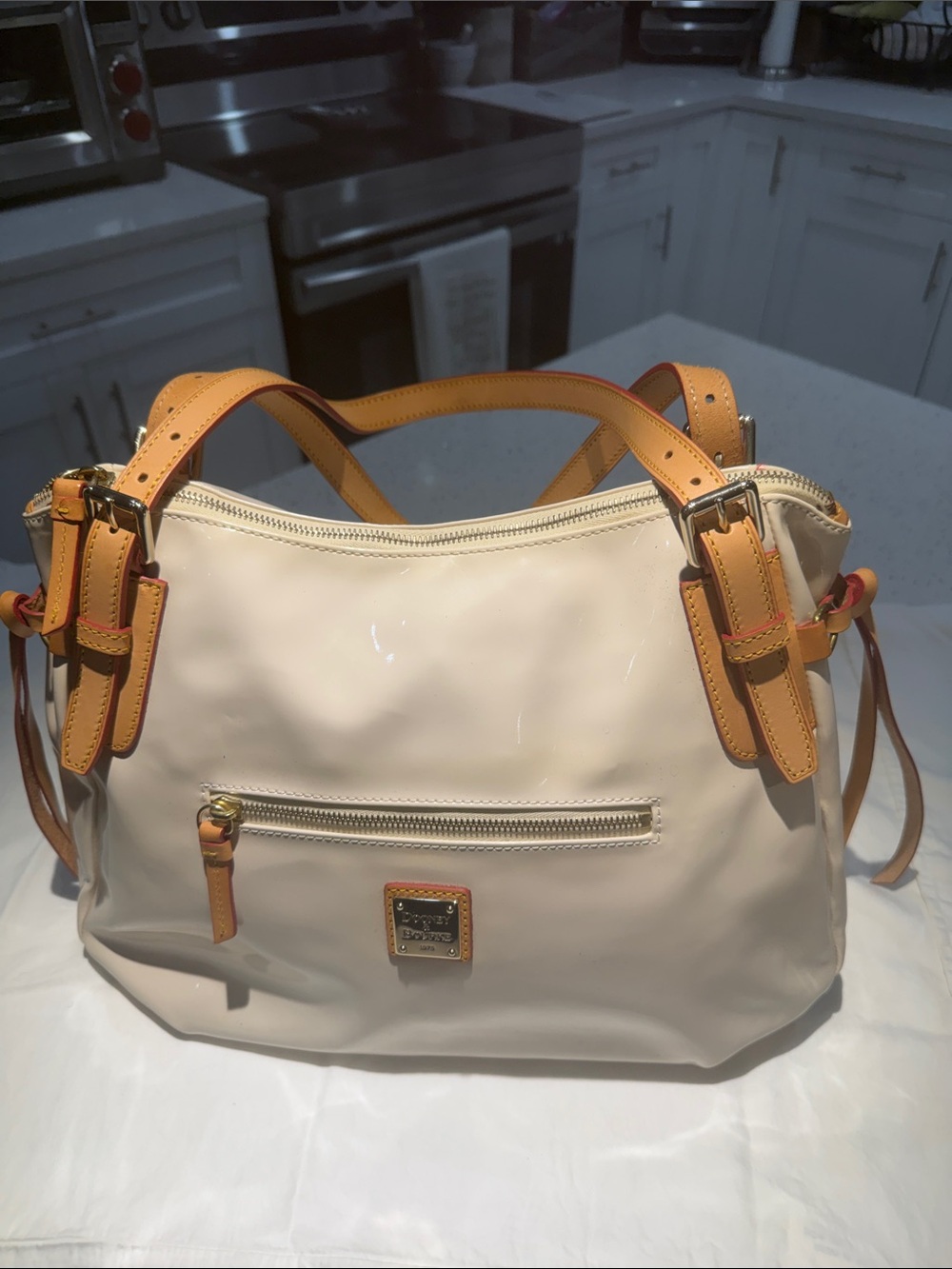 Dooney & Bourke Cream Shoulder Bag with Tan Trim